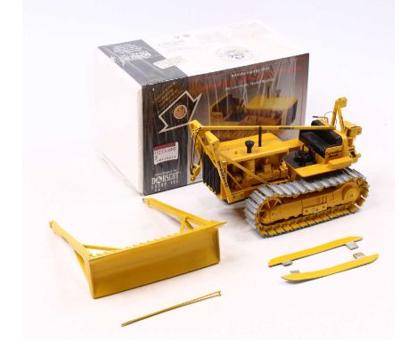 A NZG Norscot 1/25 scale limited edition No. 399 Caterpillar RD8 Diesel Tractor of usual colourway with silver tracks, housed