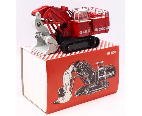 An O&amp;K 1/50 scale Auto Russia RH200 Mining Excavator housed in polystyrene with a pictorial card sleeve