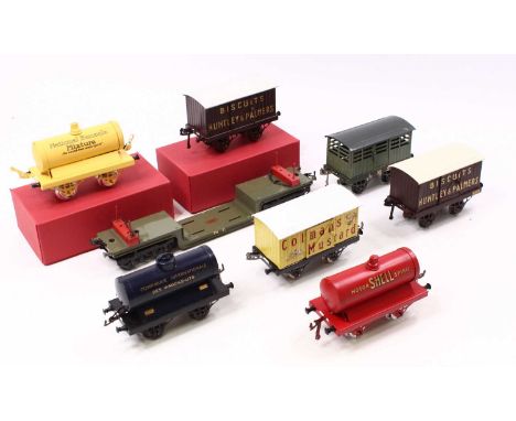 Eight totally repainted Hornby 0-gauge wagons, seven open axleguard and repainted to near original designs and colours: two H
