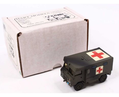 A Hart Models 1/48 scale white metal and resin kit built model of a HT42 1-ton ambulance in military green with matching hubs