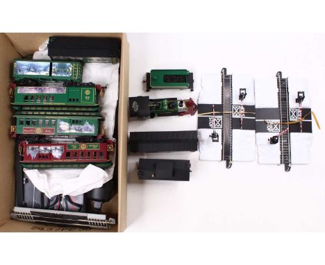 Bachmann Thomas Kincaid Christmas Express rolling stock. Running on 00 gauge track the stock looks closer to 0 gauge. One 2-6