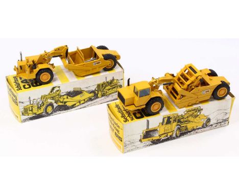 NZG 1/50 scale group of two to include No. 122 Cat 621 Push Pull Wheeled Scrapper together with No. 260 Cat 615 Elevating Whe