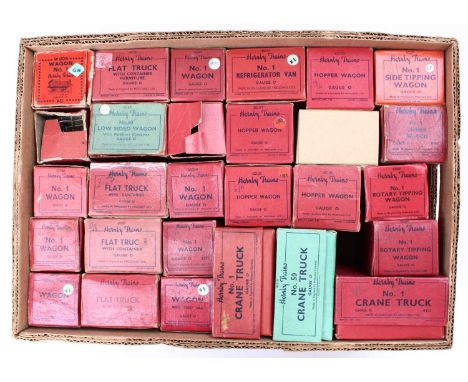 A large tray containing 28 Hornby boxed 0-gauge 4-wheeled goods wagons, mainly post-war. A selection including crane trucks, 