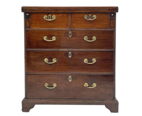 George III mahogany bachelors chest, the moulded rectangular fold over top with leather inset supported by two slide out stay