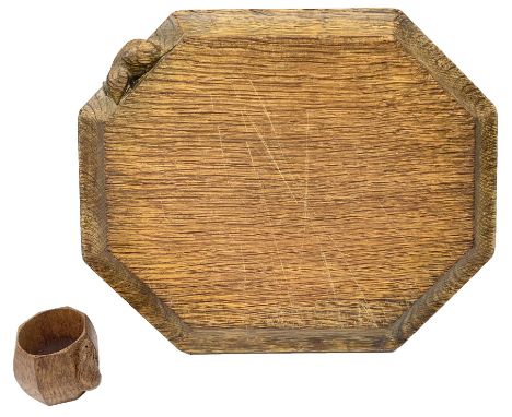 'Mouseman' oak breadboard, canted rectangular form, carved with fat mouse signature and a napkin ring by Robert Thompson of K