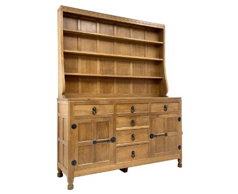 'Mouseman' adzed oak dresser, raised three heights plate rack, six drawers and two cupboards, carved with mouse signature, by