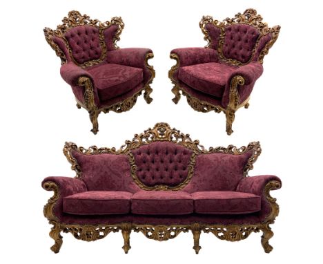 Late 20th century Italian style carved beech framed three seat sofa and pair matching armchairs, the framed carved and pierce
