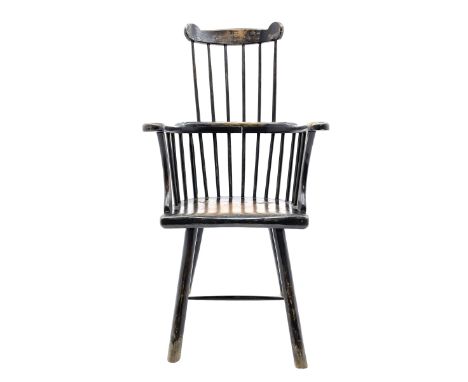 Primitive style elm and oak comb back Windsor armchair, the eared cresting rail over high stick back, concaved elm seat on pl