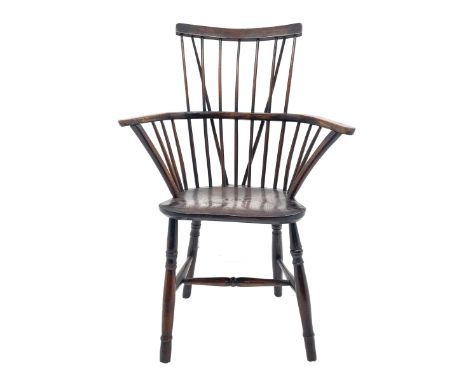 Early 19th century elm, beech and oak Windsor armchair, the plain cresting rail over low stick and hoop back, dished seat, tu