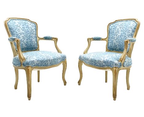 Pair French style bedroom armchairs, moulded frames and scroll carved arms, serpentine seat with cabriole supports, upholster