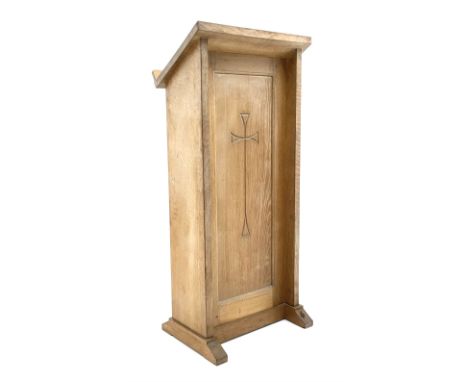 'Mouseman' oak ecclesiastical lectern, sloped book rest over panelled front carved with cross, plain end supports on sledge f