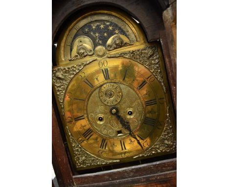 An 18th Century and later stained frame longcase clock having arch top pillar hood, containing 8 day brass movement, named We