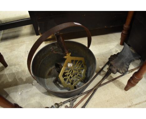 A brass jam pan, trivet and selection of fire tools