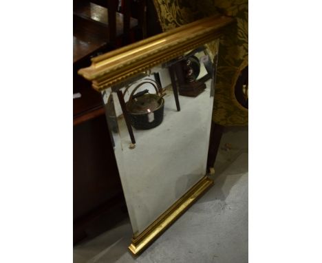 A vintage gilt frame wall mirror having open sides