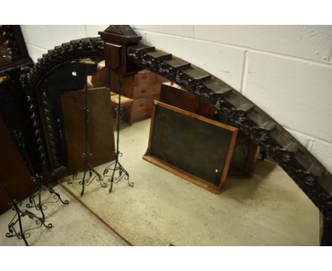 A 19th Century oak over mantel or grand hall mirror, having twist column and carved support , central cartouche to arch, was 