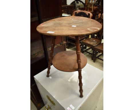 A Victorian stained frame tripod table having circular top and undertier , with simulated bamboo legs