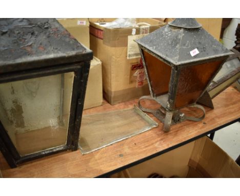 Two traditional lamp tops and a similar wall light fitting