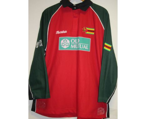 CRICKET- ZIMBABWE Zimbabwe red and green playing shirt which belonged to Blignaut and was exchanged with Andrew Hall of South