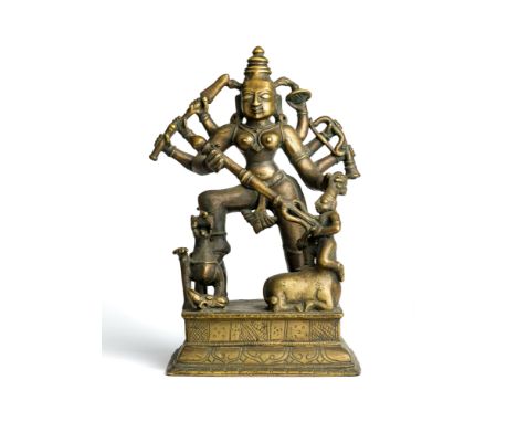A BRONZE FIGURE OF DURGA MAHISASURAMARDINI, WESTERN DECCAN, CIRCA 18TH CENTURY  on raised plinth, the eight armed goddess hol