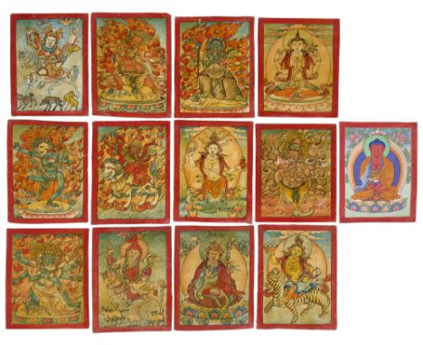 A GROUP OF THIRTEEN SMALL BUDDHIST PAINTINGS OF DEITIES, TIBET, CIRCA 1900 six painted on cloth, the remainder on paper, each