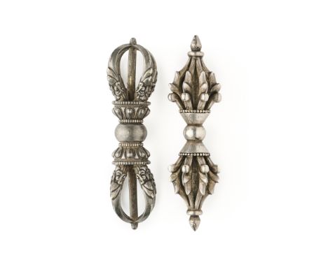 TWO SMALL SILVER RITUAL THUNDERBOLTS (DORJE), TIBET, 18TH/19TH CENTURY one with waisted double lotus handle with fourfold sty