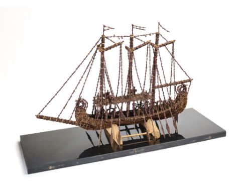 A MODEL BOAT, MOLUCCAS (MALUKU), INDONESIA, EARLY 20TH CENTURY made of numerous individual clove buds stitched together, the 