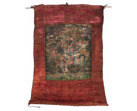 A THANG-KA DEPICTING LHA-MO ON HER MULE, TIBET, 19TH CENTURY pigment on cloth, riding through a hilly landscape amidst billow