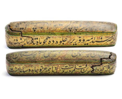 TWO KASHMIR PAPIER MACHE PEN BOXES, 19TH CENTURY  each with sliding compartment, the exteriors painted with black nastaliq ca
