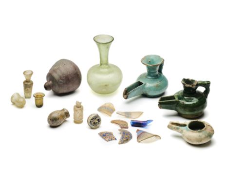 A COLLECTION OF MOSTLY ISLAMIC GLASS AND POTTERY VESSELS AND FRAGMENTS, 4TH-14TH CENTURIES  comprising a Roman olive green gl