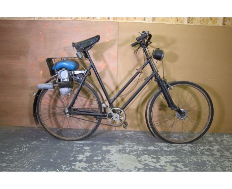 A Raleigh ladies' bicycle with Power Pak motor attachmentframe number 97057P, engine number 10473, displaying registration nu