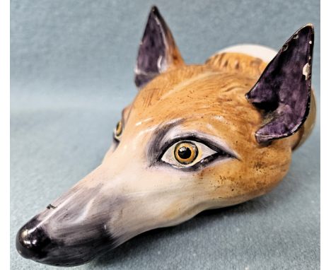 19th century hand painted and gilded fox mask form ceramic stirrup cup. Approx. 14cms L
used condition with very minor fleabi