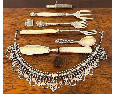PLATED PICKLE FORKS, SILVER CIGARETTE HOLDER, SILVER COLOURED NECKLACE APPROX 74g, INTAGLIO SEAL, ETC