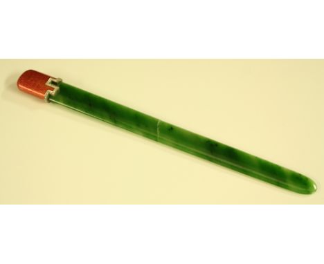 An Art Deco diamond mounted enamel handled jadeite paper knife, pink guilloche enamel end cap with stepped collar of forty ei