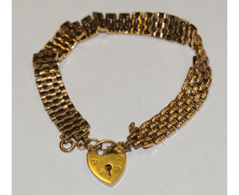 A 9ct gold textured gate bracelet, heart padlock clasp, 21.2g gross