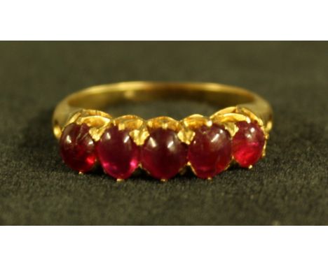 A ruby quintet ring, linear set with five pinky red cabochon rubies, total estimated ruby weight approx 2.54ct, crown claw cr