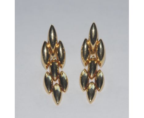 Cartier - a pair of retro 1980s 18ct gold scale drop earrings, each composed of seven navette links, articulated lower sectio