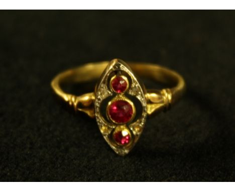 An Art Deco style ruby and diamond navette cluster ring, open crest inset with three vibrant pinky red rubies and four old cu