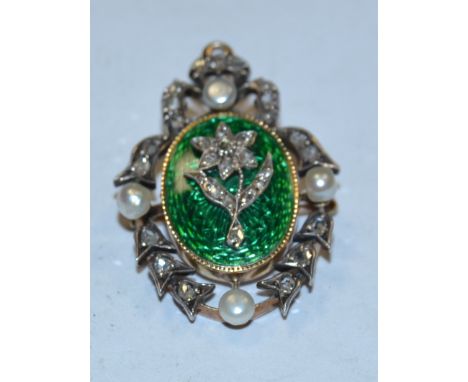 A 19th century diamond pearl and enamel pendant brooch, central diamond flower upon a green enamelled oval ground, all surrou