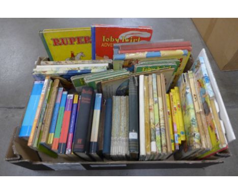 A collection of books including a Harry Potter first edition, a collection of Rupert books, etc. **PLEASE NOTE THIS LOT IS NO