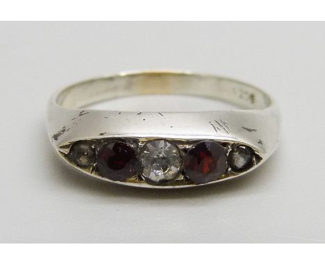 A 9ct white gold, garnet and white stone ring, 2.6g, N 