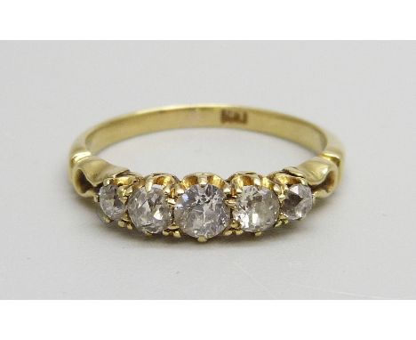 An early 20th Century 18ct gold five stone diamond ring, 2.8g, O 