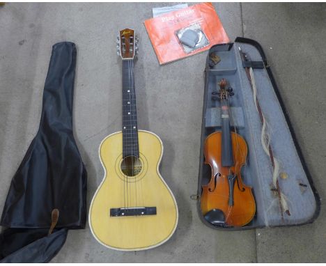 A violin and an acoustic guitar, violin a/f, length of back excluding button 33.5cm 