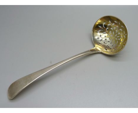 A silver sifter ladle, London 1829 with silver gilt bowl, 51g 