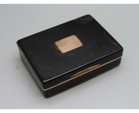 A malacca snuff box with yellow metal cartouche and trim,  85mm x 60mm, a/f 