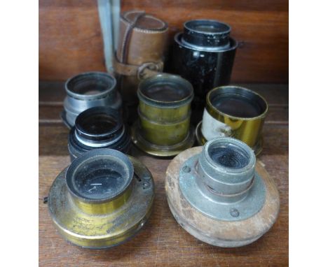 Eight vintage magic lantern/camera lenses 