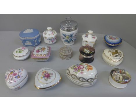 A collection of thirteen trinket boxes and an egg coddler 