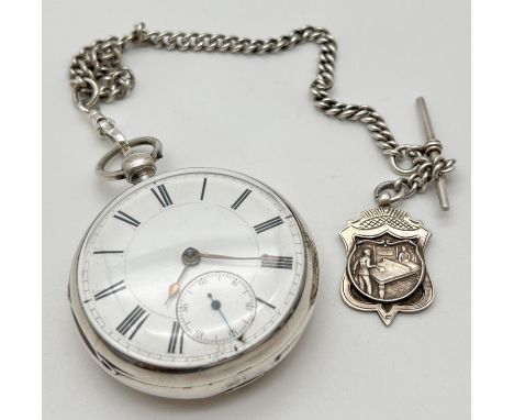 A Victorian fusee silver pocket watch, hallmarked London 1886. Complete with white metal Albert and vintage silver table tenn