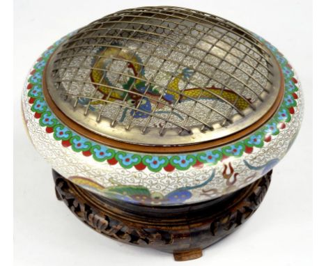 A CHINESE CLOISONNÉ ENAMEL DRAGON BOWL, OF COMPRESSED FORM, WITH WHITE GROUND, 20CM D, SILVERED METAL FLOWER GRID, ON CARVED 