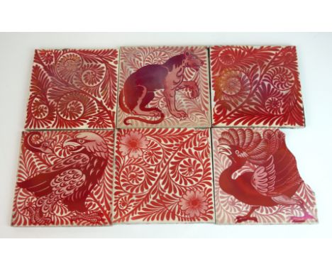 Six William De Morgan ruby lustre tiles one painted with an eagle and serpent with a fern painted background one painted with