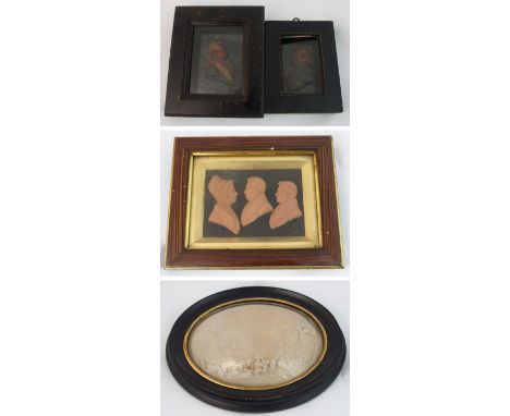Two early 19th Century painted wax silhouettes the glazed and framed wax silhouettes of Georgian Naval officers in Naval unif